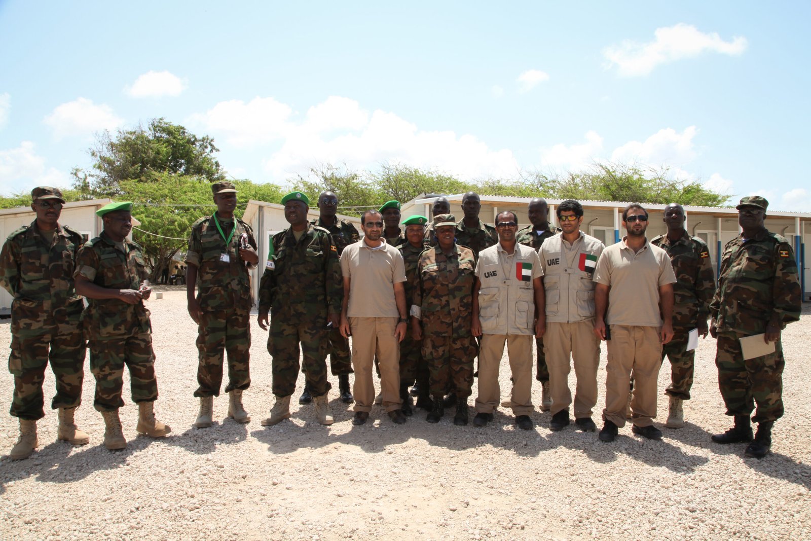 Members of a team donating medical equipment to AMISOM's Level II hospital in Mogadishu, Somalia, stand with member's of AMISOM at the hospital. AU UN IST PHOTO - ILYAS A. ABUKAR (9237187319)