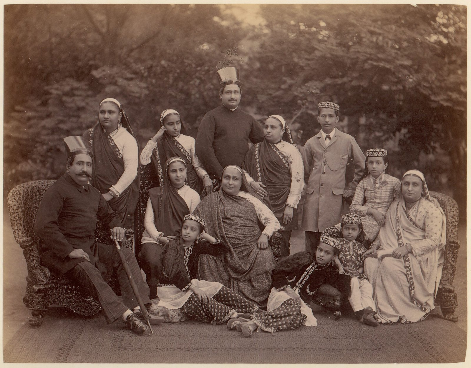 -Formal Family Portrait of Thirteen People, Men in European Dress- MET DP71255